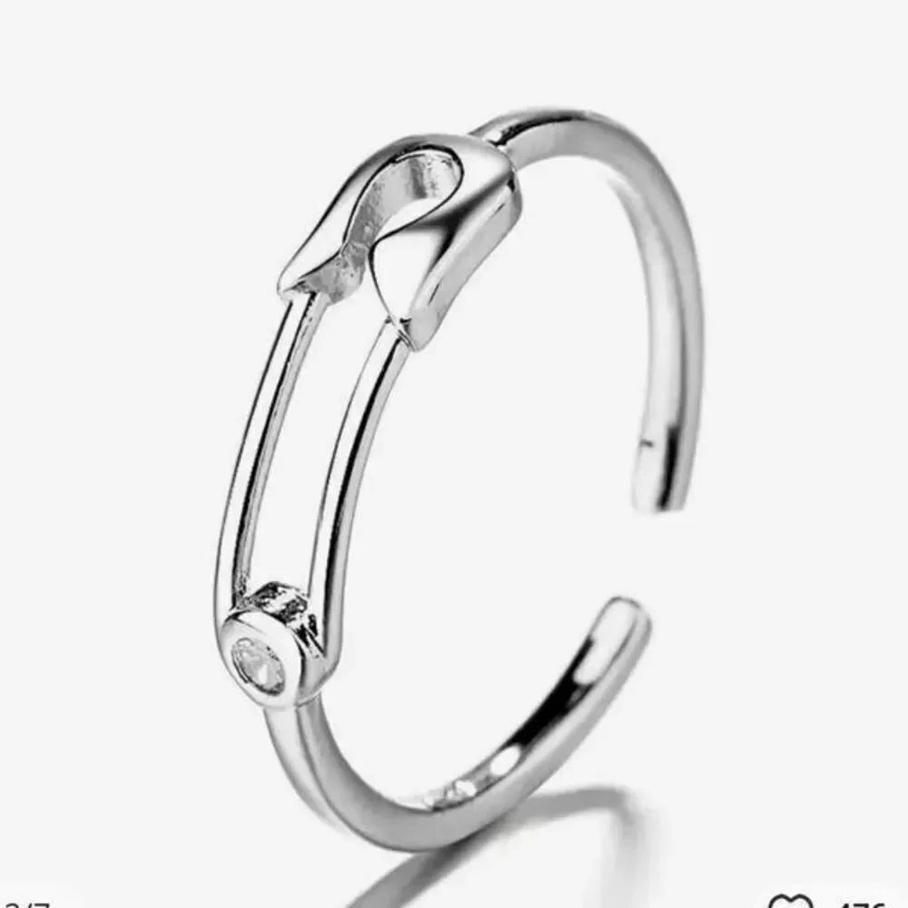 The Mini Safety Pin Ring with cubic zirconia